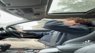 Adult man buys and drinks from baby bottle